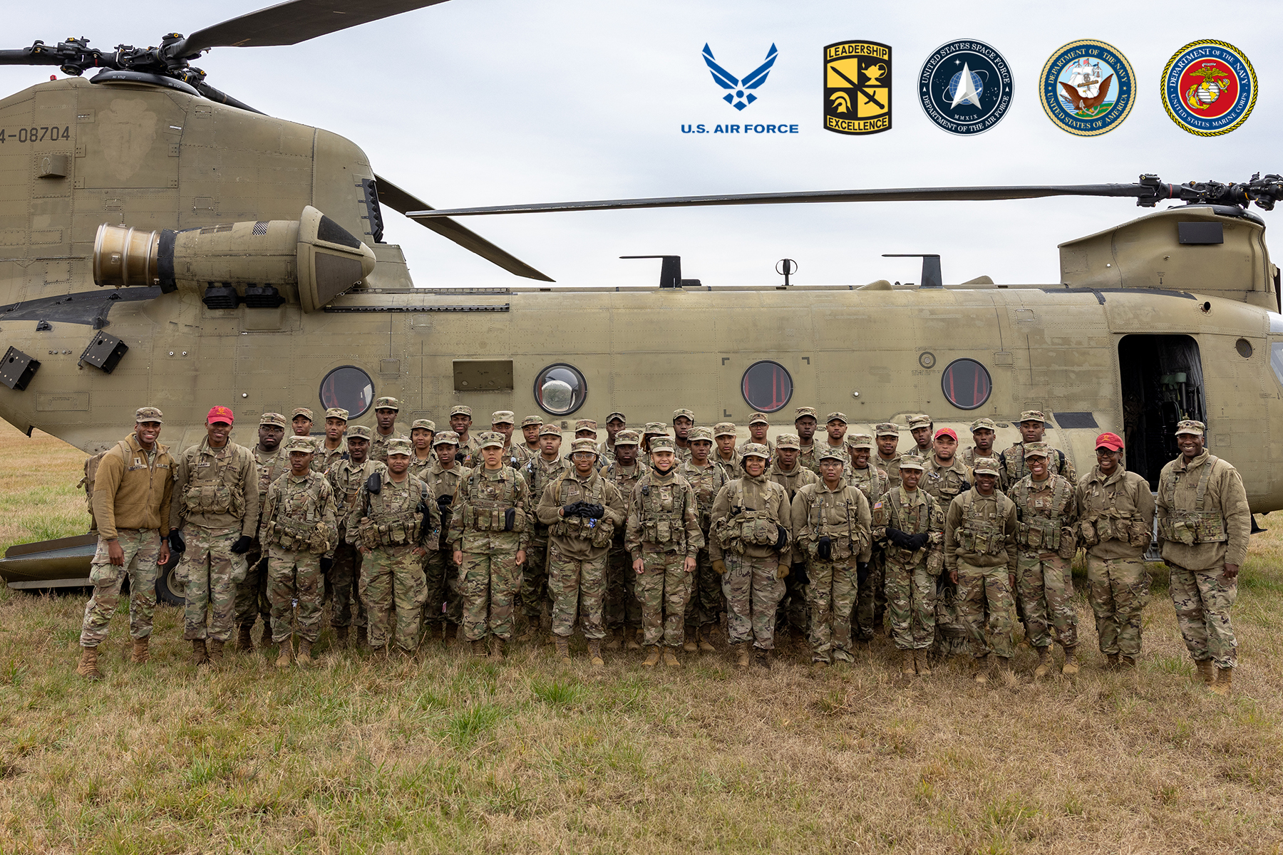 ROTC cadets and leaders standing by helicopter