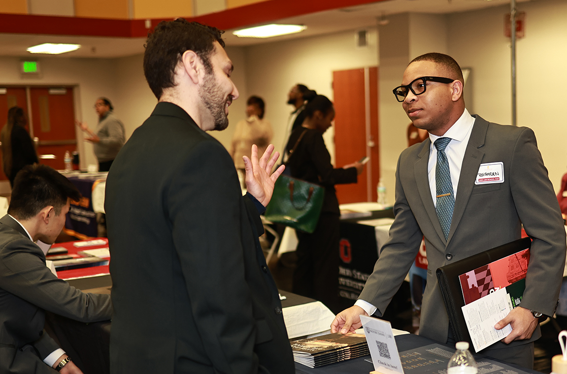 Law School representative talking with student