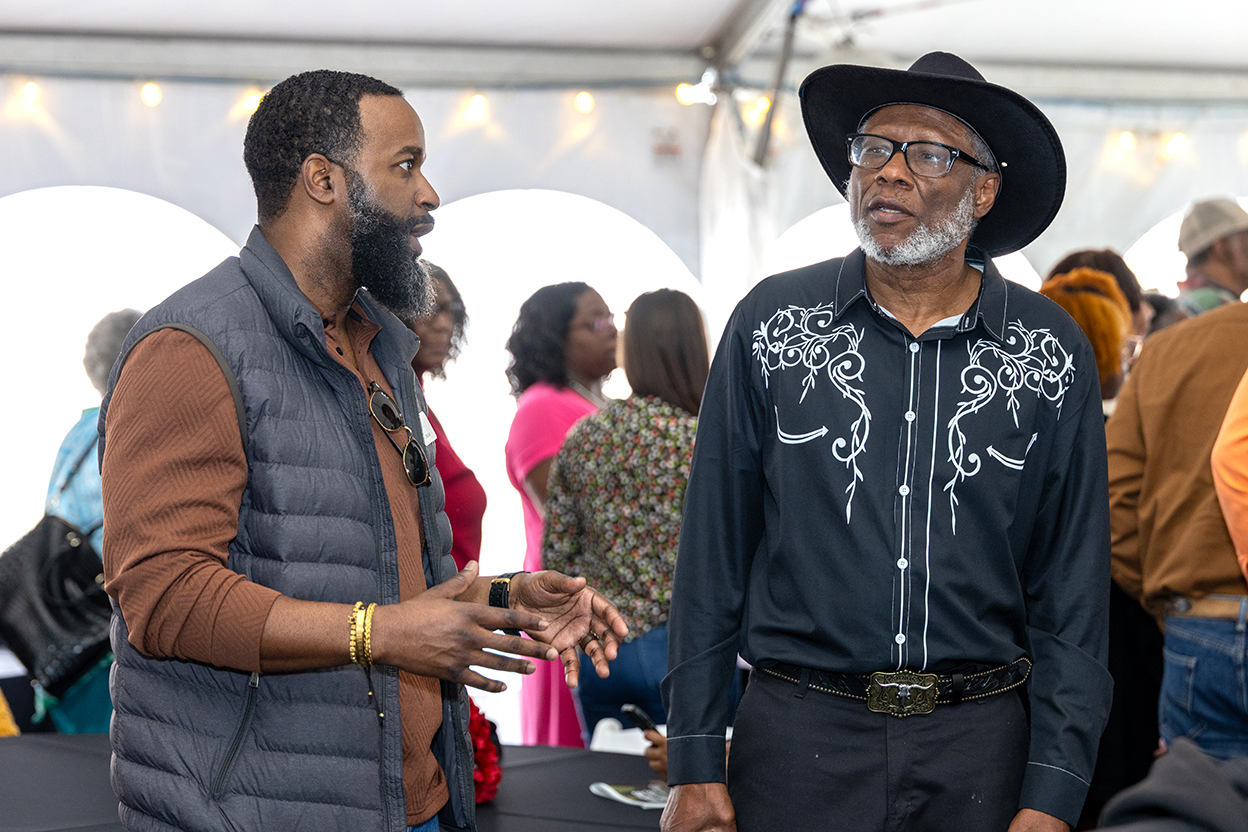 Farmers and agriculture professionals in conversation