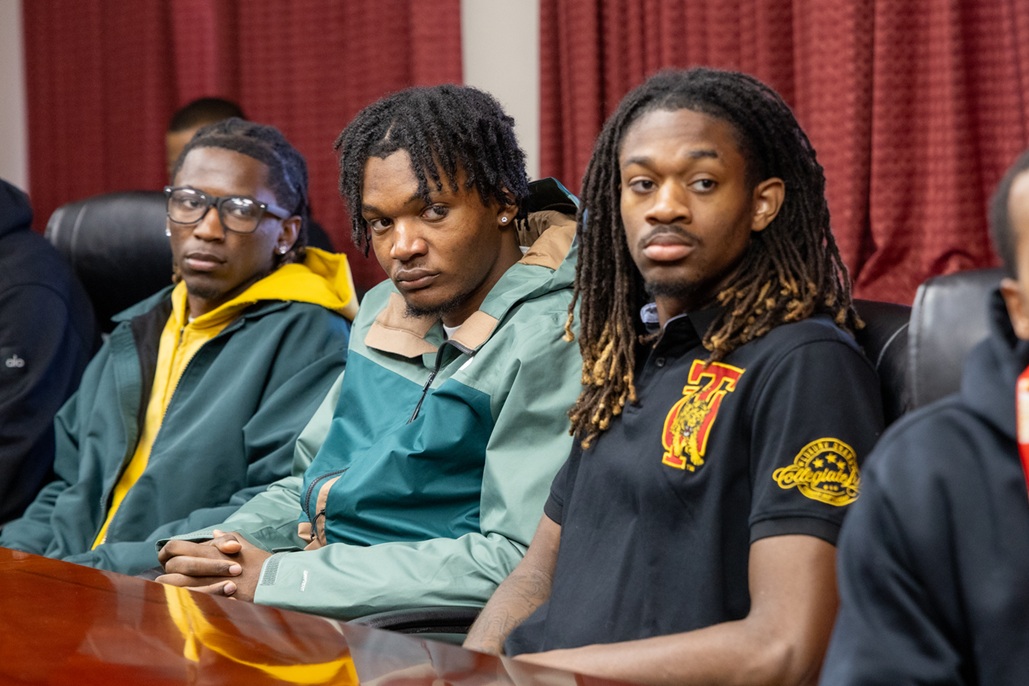 MBB players seated around the table during meeting with Dr. Brown_pic2