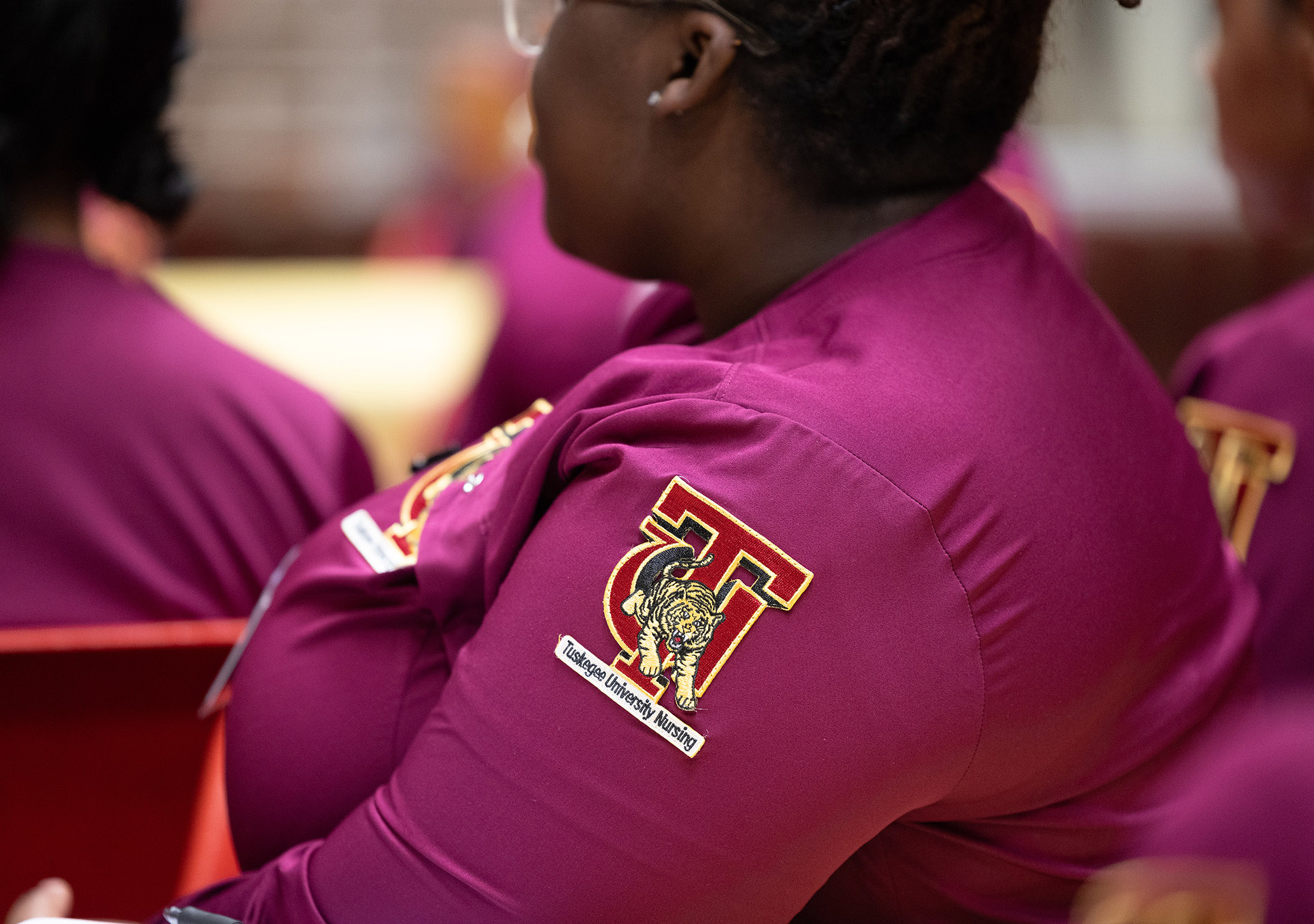 TU Nursing logo on a uniform