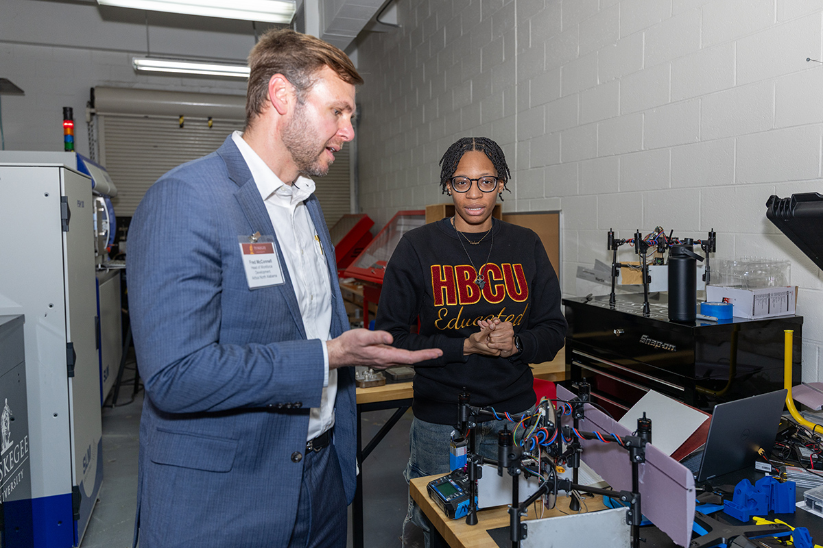 Camille White demonstrrates her design