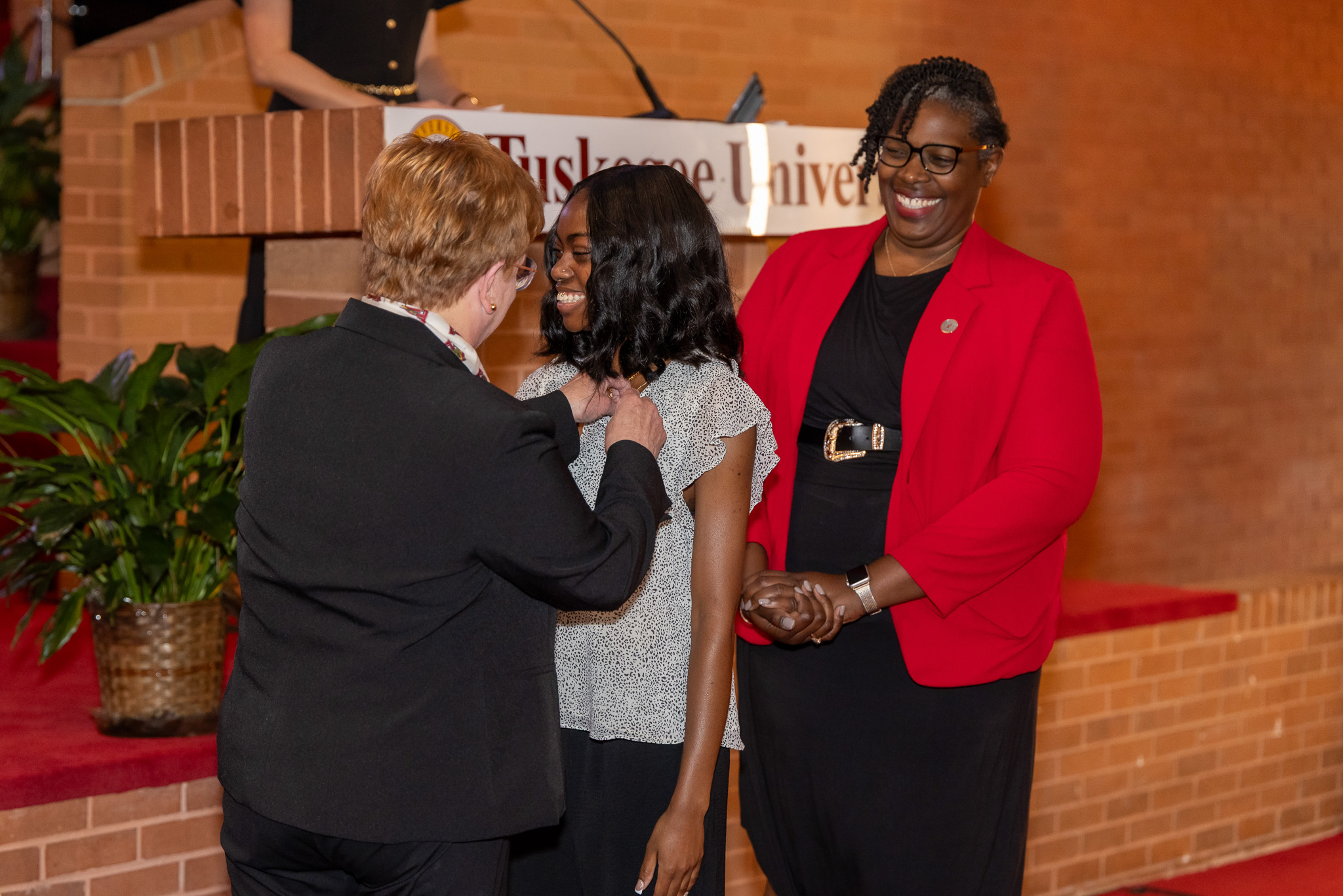 School of Education graduate getting pinned