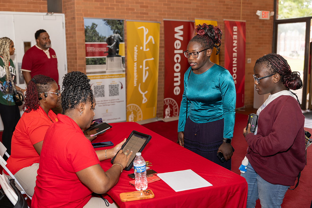 Students at check-in desk