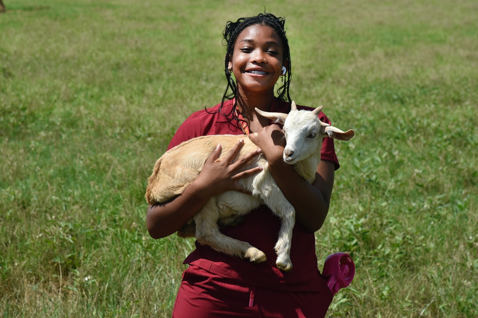 Student with baby goat