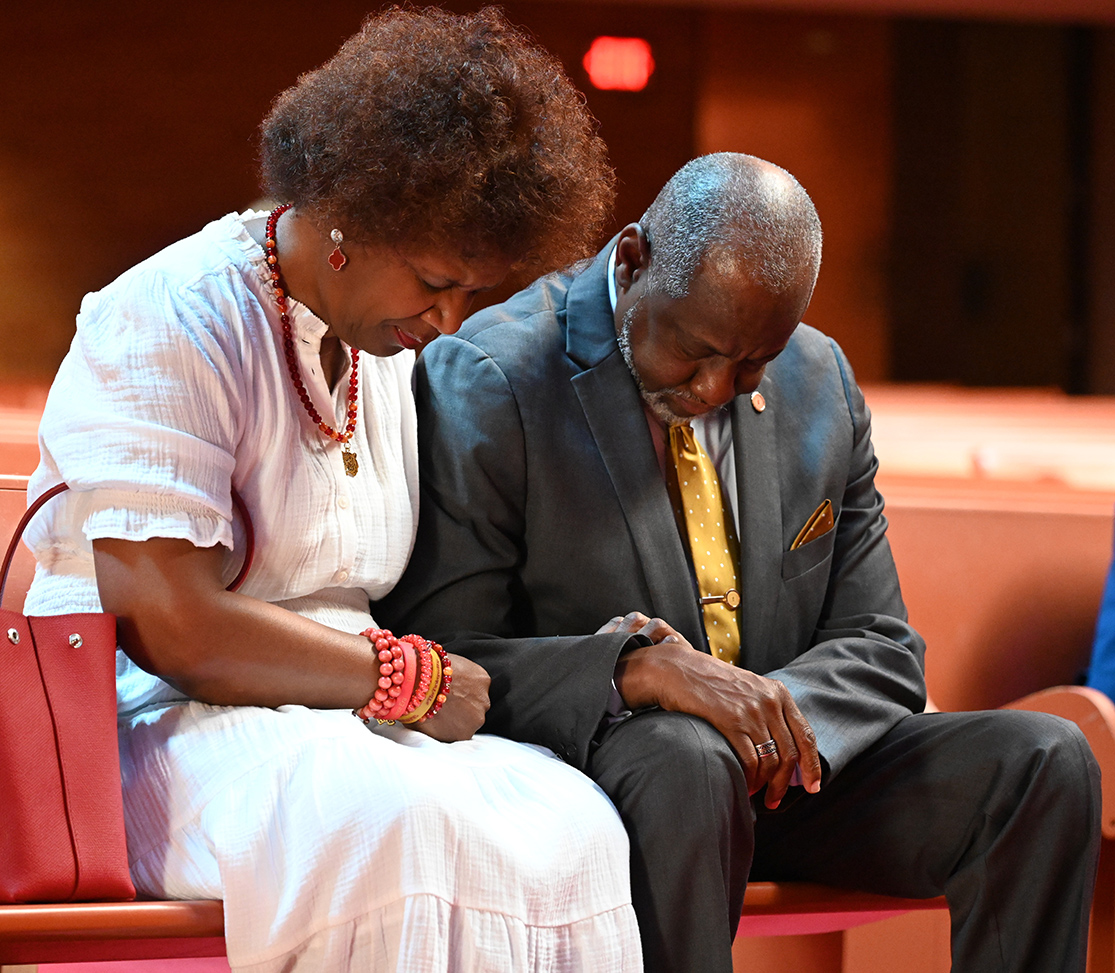 Dr. and Mrs. Brown praying at the Chapel