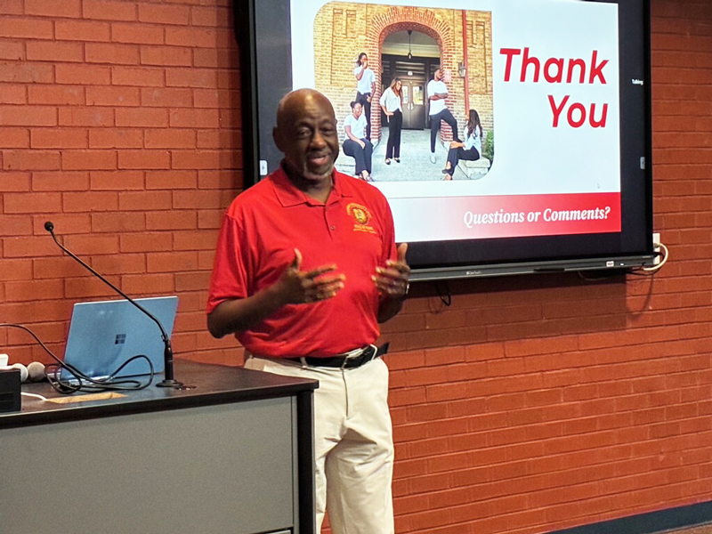 Dr. Mark A. Brown address audience