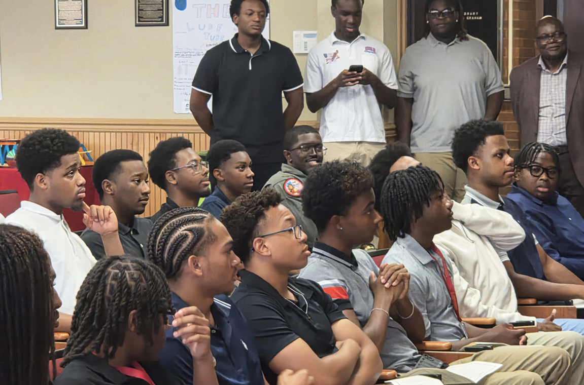 MITAS program students sitting listing to speakers