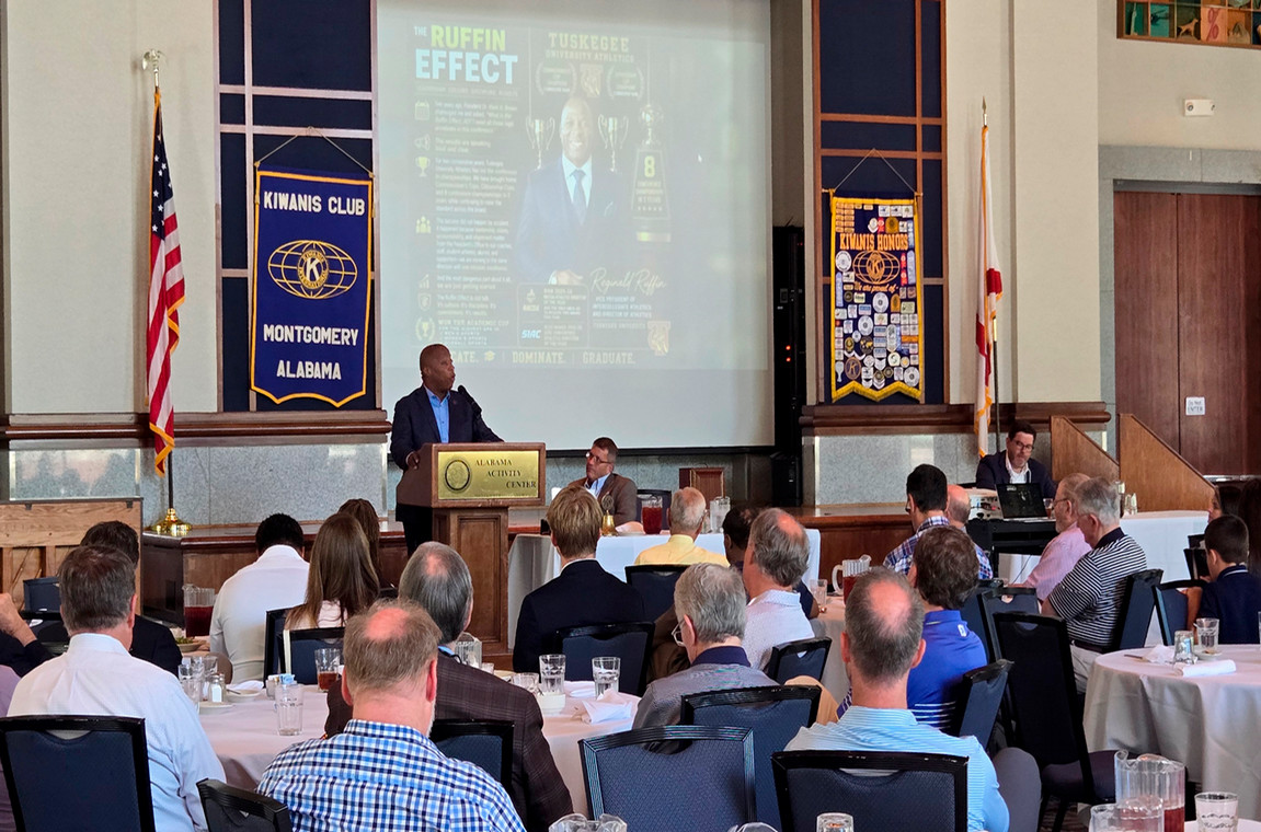 Reginald Ruffin, VP of Intercollegiate Athletics and Athletic Director at podium