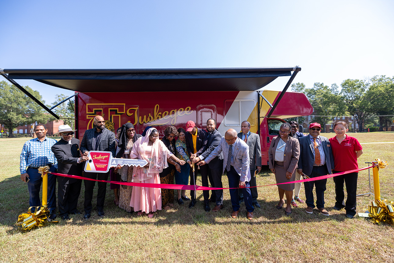 CHOB bus ribbon cutting