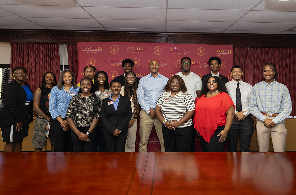 Rep. Shomari Figures and TU students take a group photo
