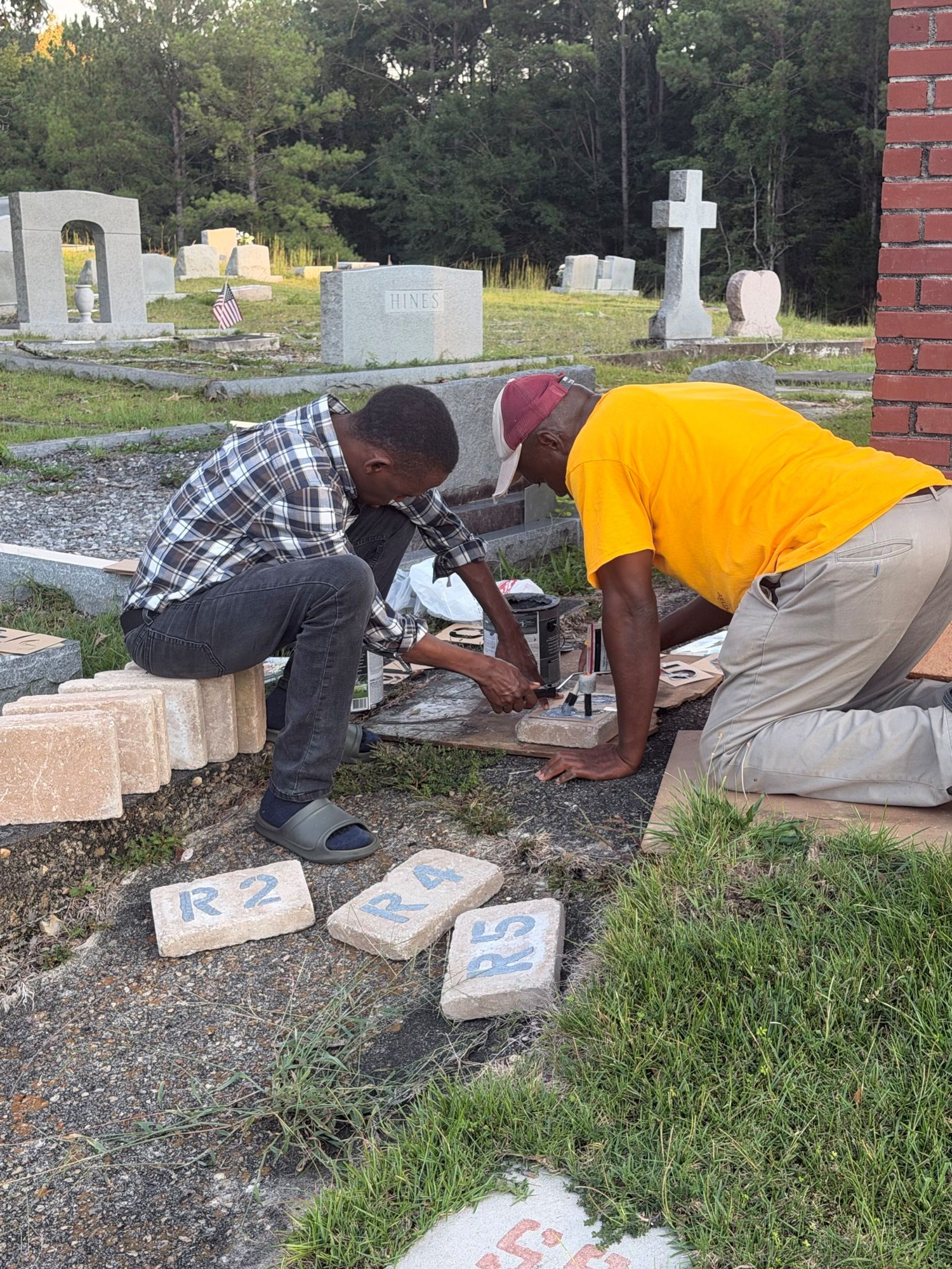 Graduate students working at the cemetery