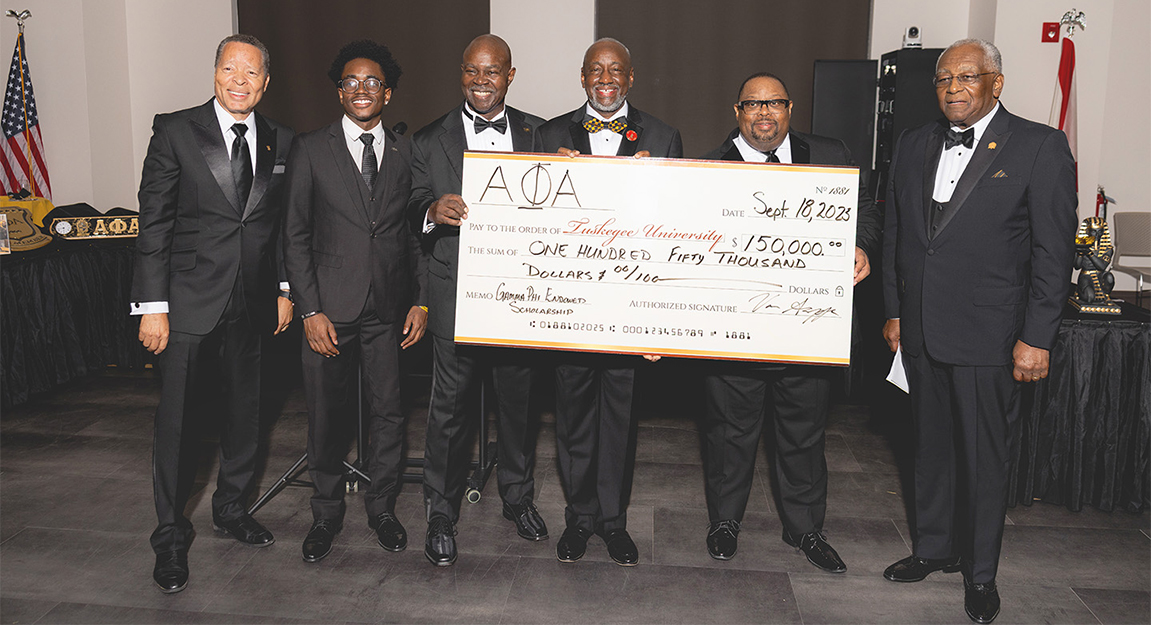 Alpha Fraternity check presentation to Tuskegee University
