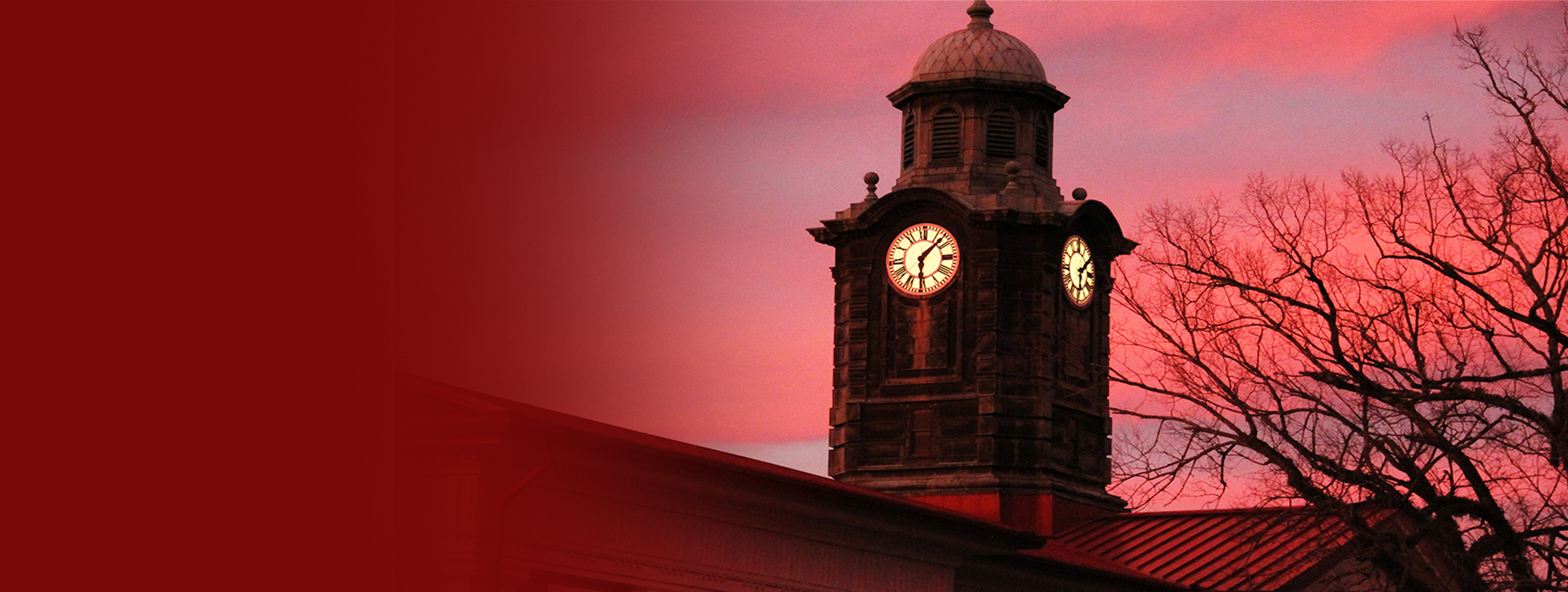 Picture of clock tower on campus at dusk