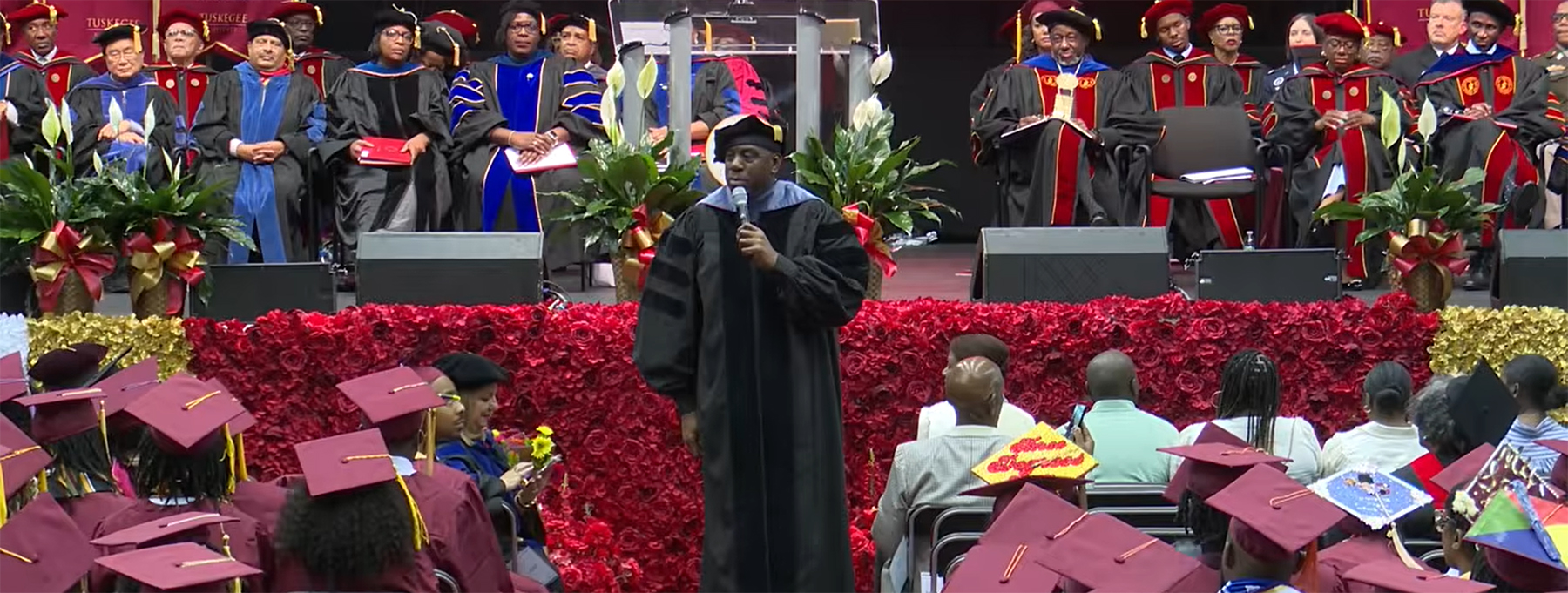 Picture of Commencement speaker speaking to audience