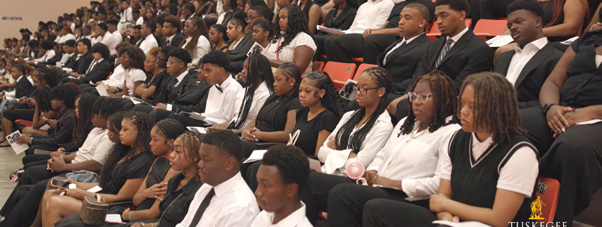 Students seated in Chappie James arena for Rites of Passage