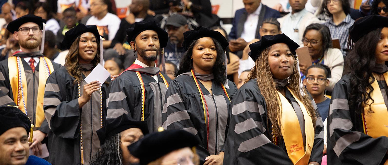 Graduates marching in