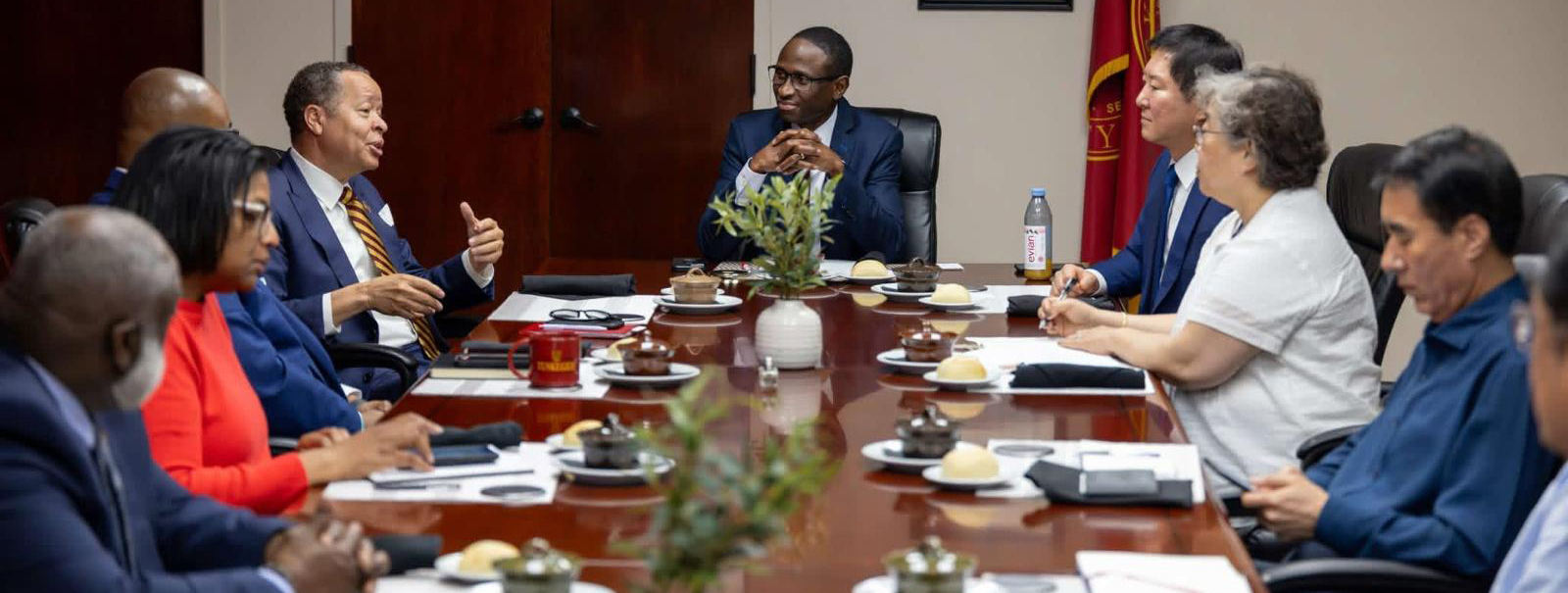 Dr. Thiam leads discussion in conference room