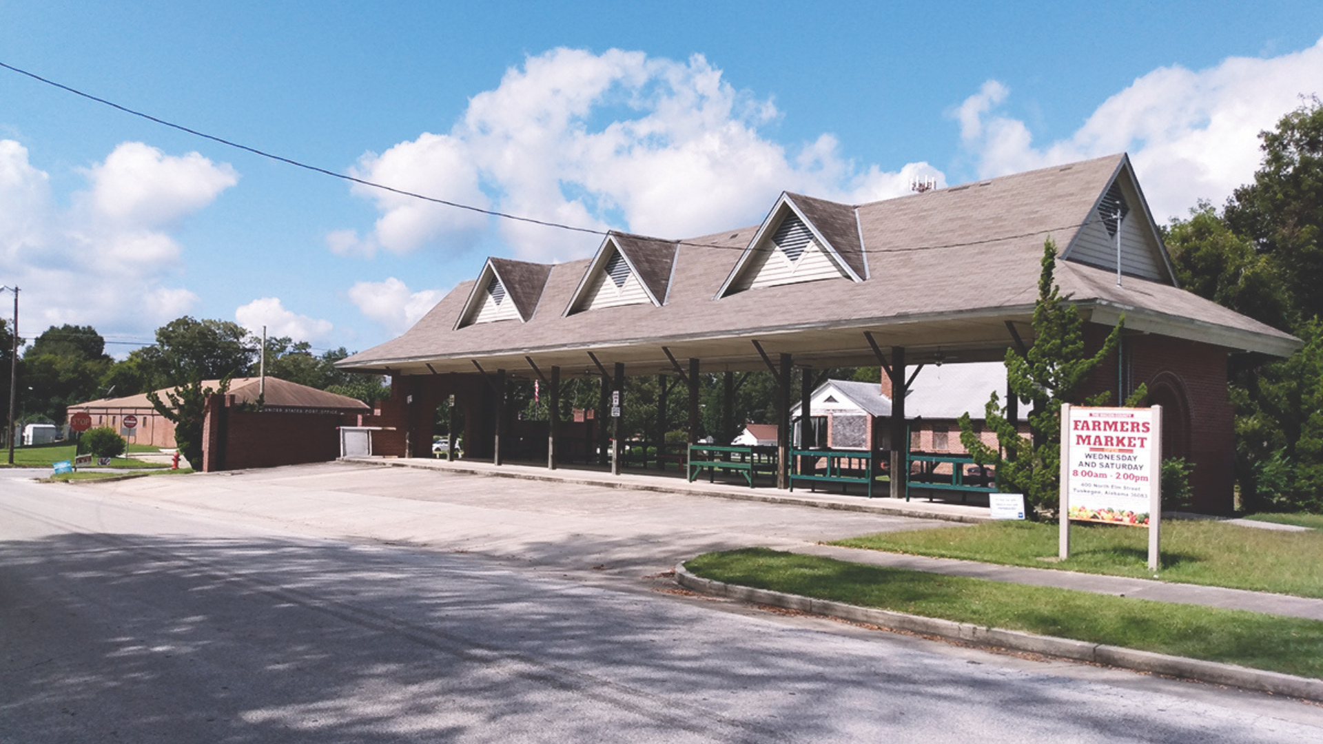 Dr. Mark Brown and Mrs. Gwen Brown with their two dogs