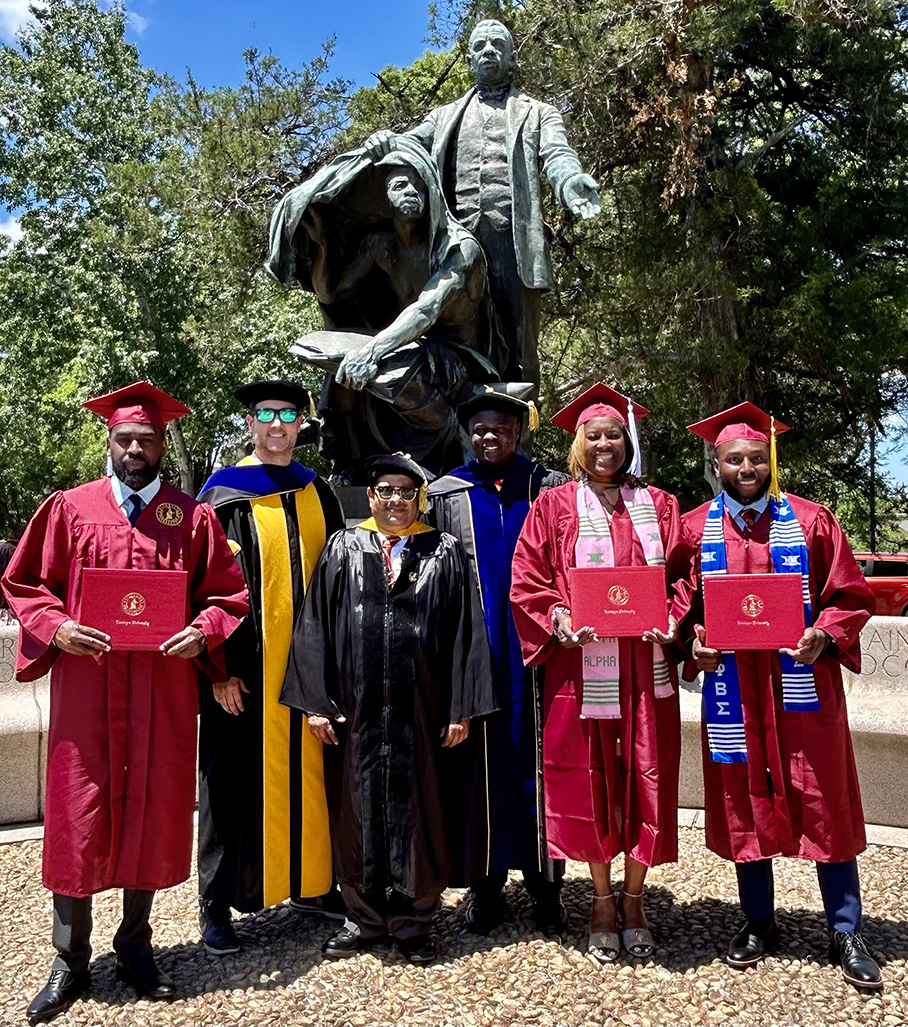 CAS Dean Prakash and Online Program Director Coppenger with graduates of the program