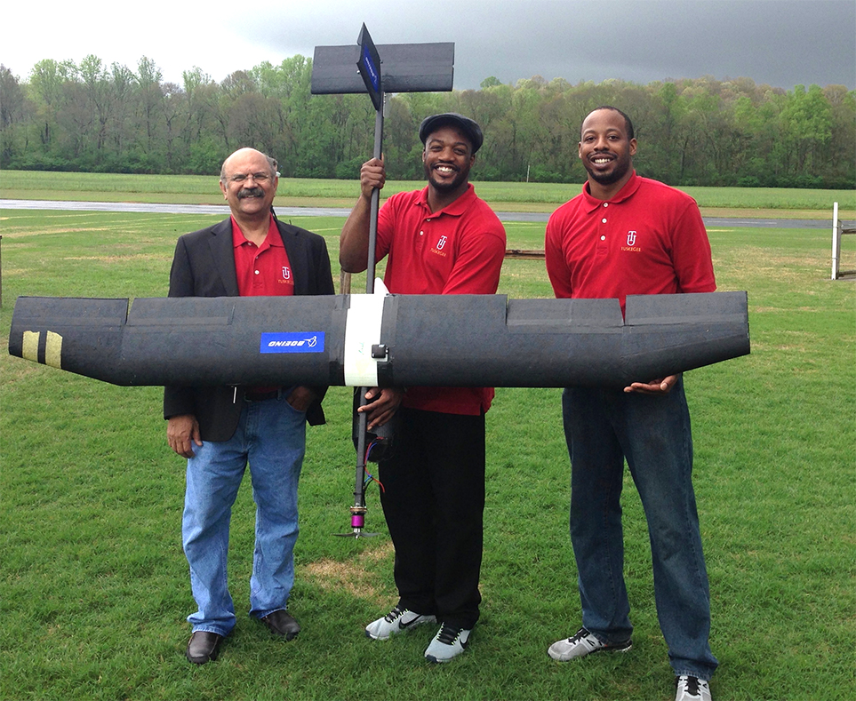 ASE students and Dean Khan with glider