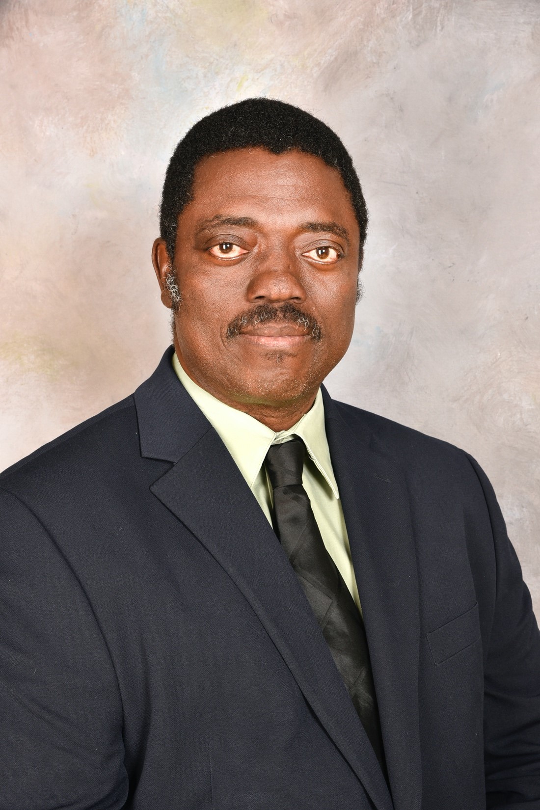 Dr. Odesmuyiwa