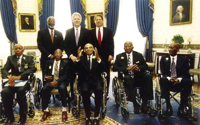 Photo of President Clinton, VP Gore, and Satcher with Syphilis study survivors