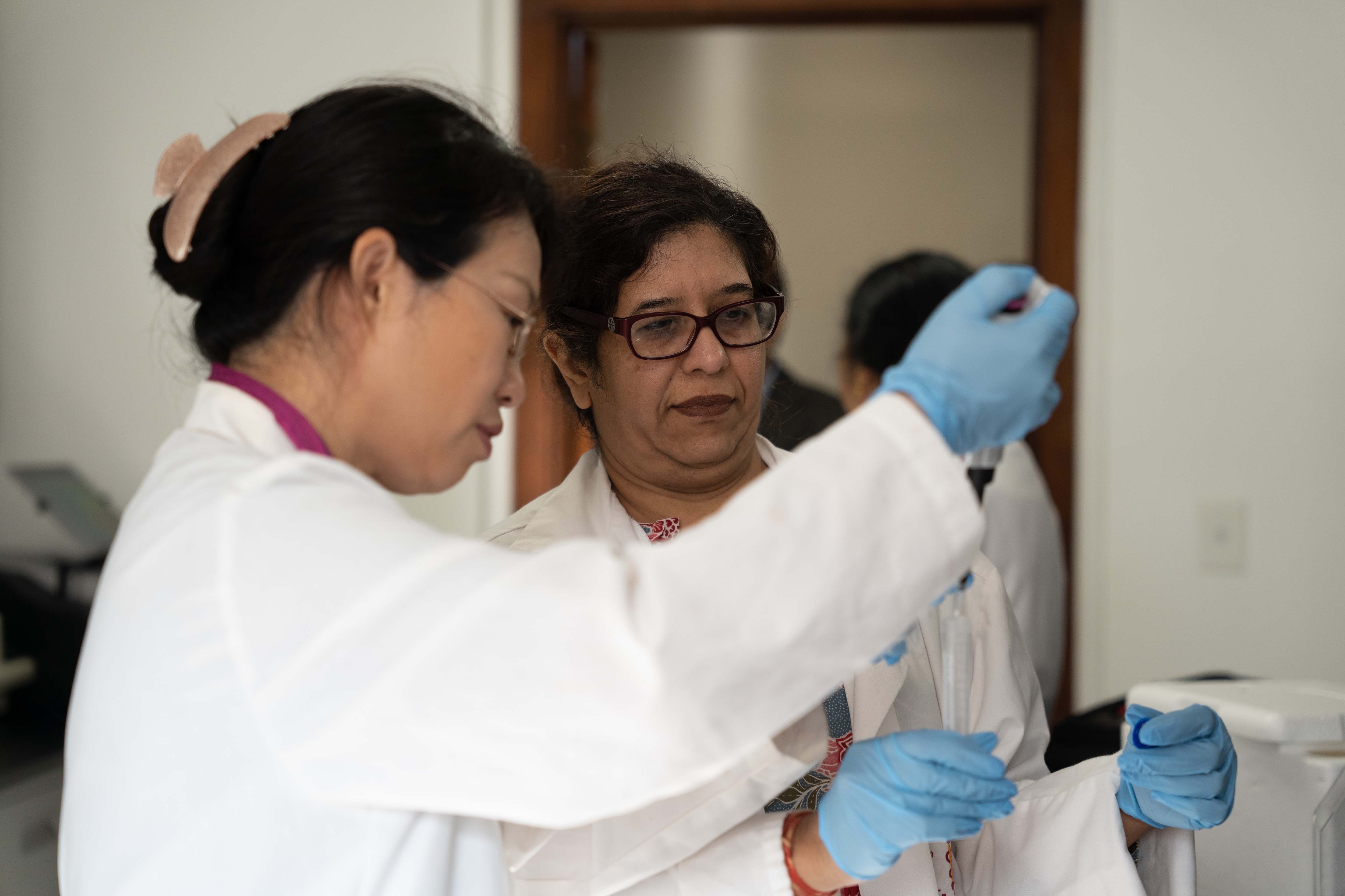 Researchers in lab