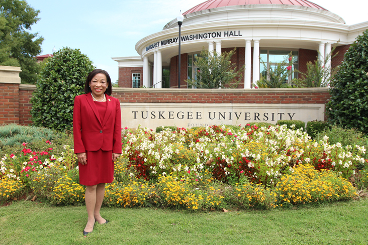 Dr. Lily D. McNair in front of Margaret Murray Washington Hall