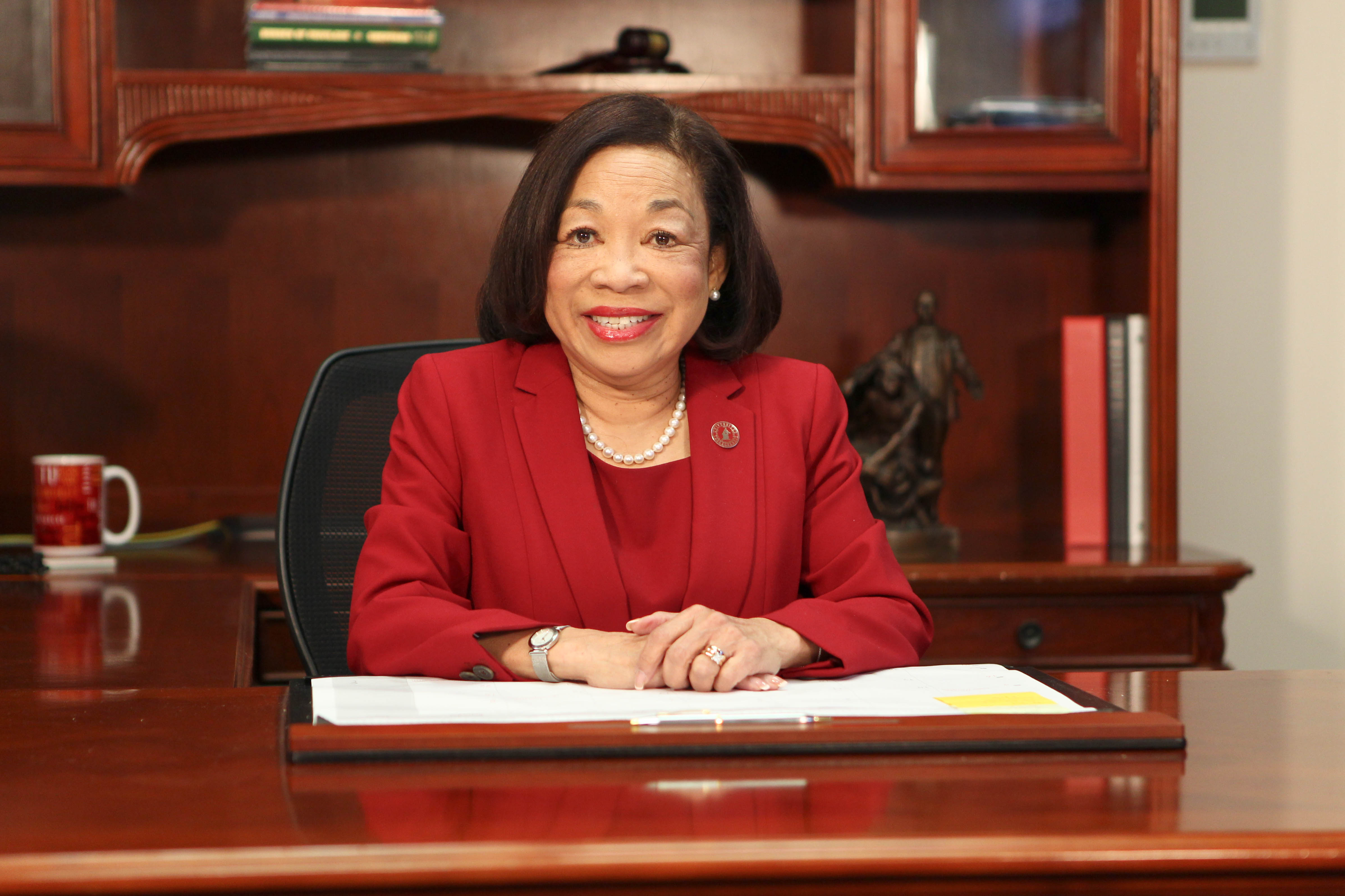 Dr. Lily D. McNair at her desk