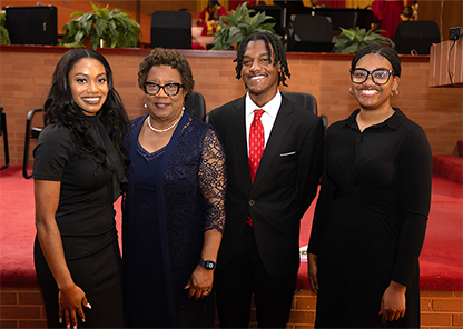 2024 President's Essay Contest Winners with President Charlotte Morris. (L-R) Aria Alridge, President Morris, Everett Mason, Jr., and Zora Cunningham.