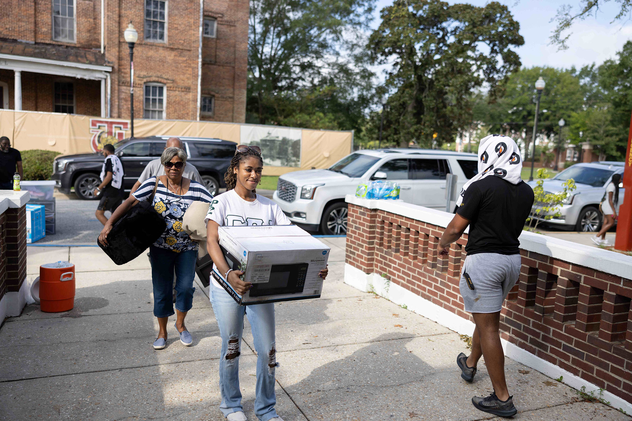 Students moving into their residence halls.