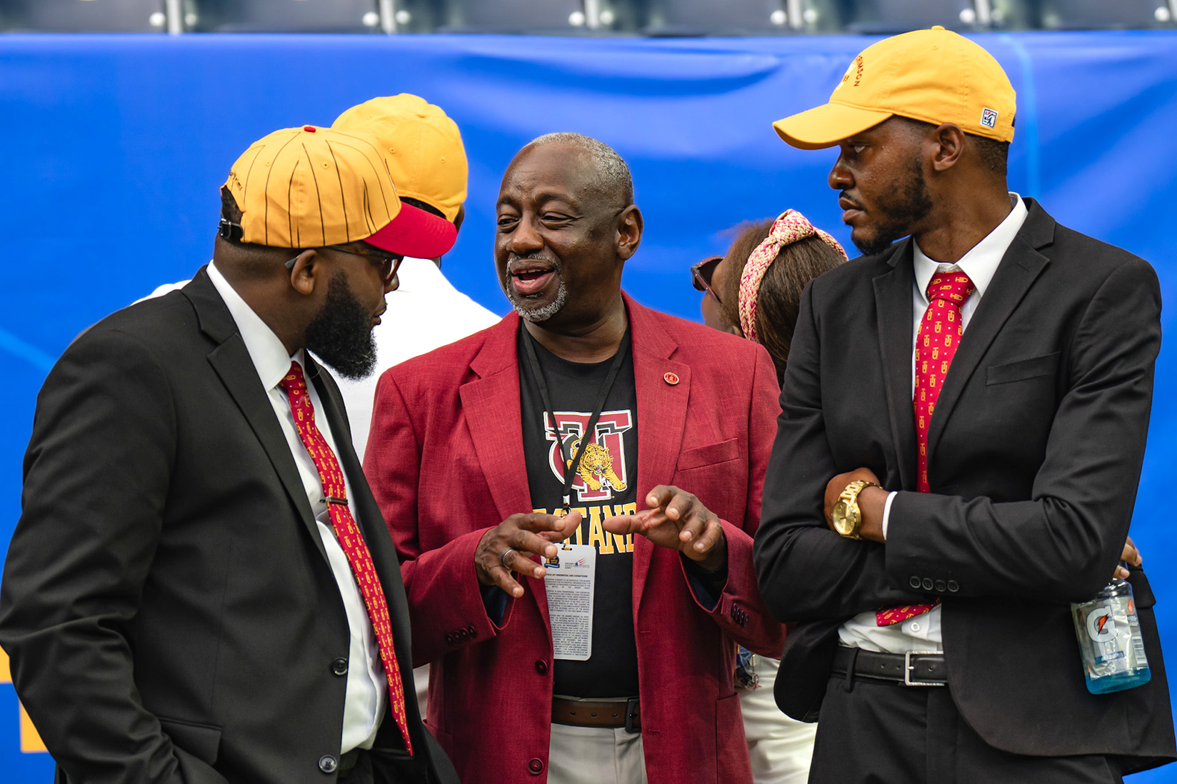 President Brown in conversation with Band Director.