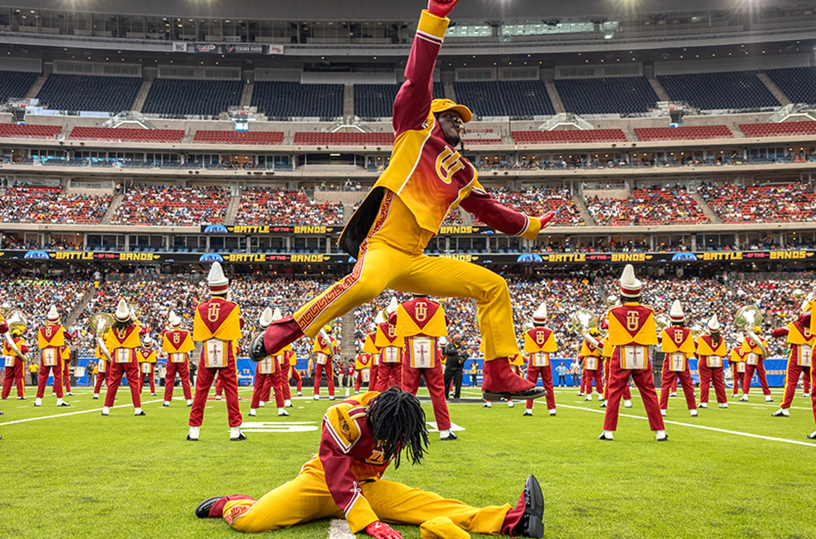 The Marching Crimson Pipers wowing the crowd at NRG Stadium in Houston.