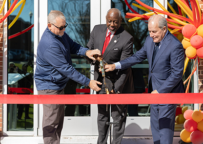 Ribbon cutting at the reopening ceremony of Olivia Davidson Hall.