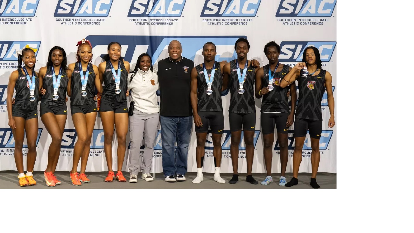 Tuskegee Track and Field men and women's teams with Athletic Director Reginald Ruffin.