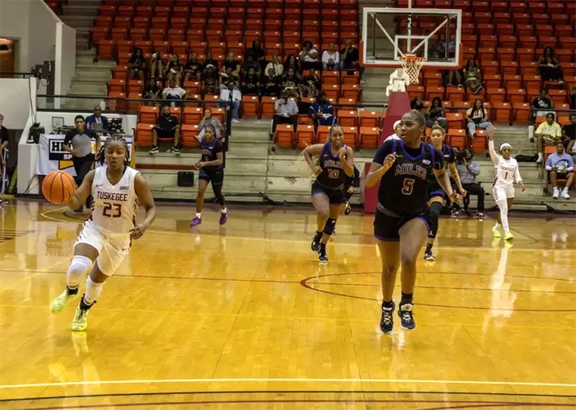 Women's basketball player in game