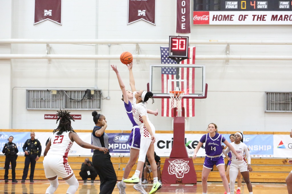 Tuskegee Women's basketball player goes up for a block.