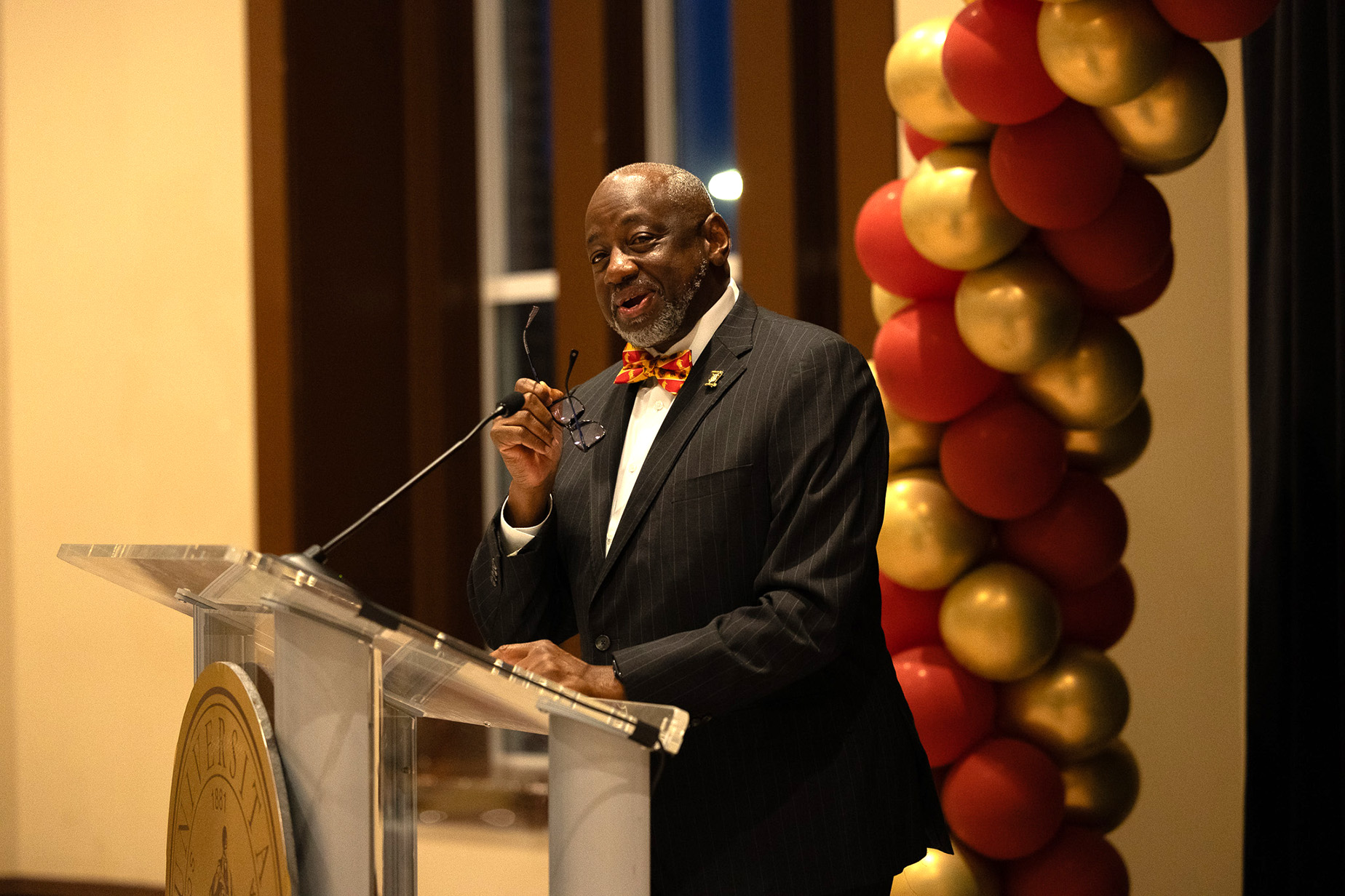 Dr. Brown greets attendees at the Founders Day banquet.