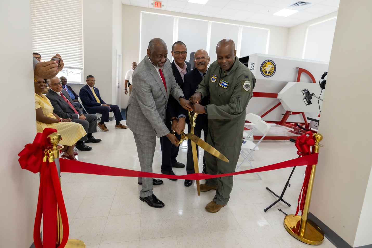 President Brown and others cut the ribbon