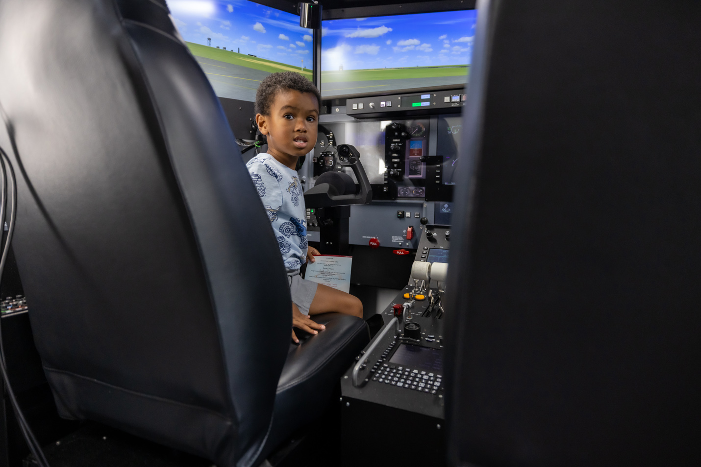 Frank Christopher Lee III inside of the flight simulator.