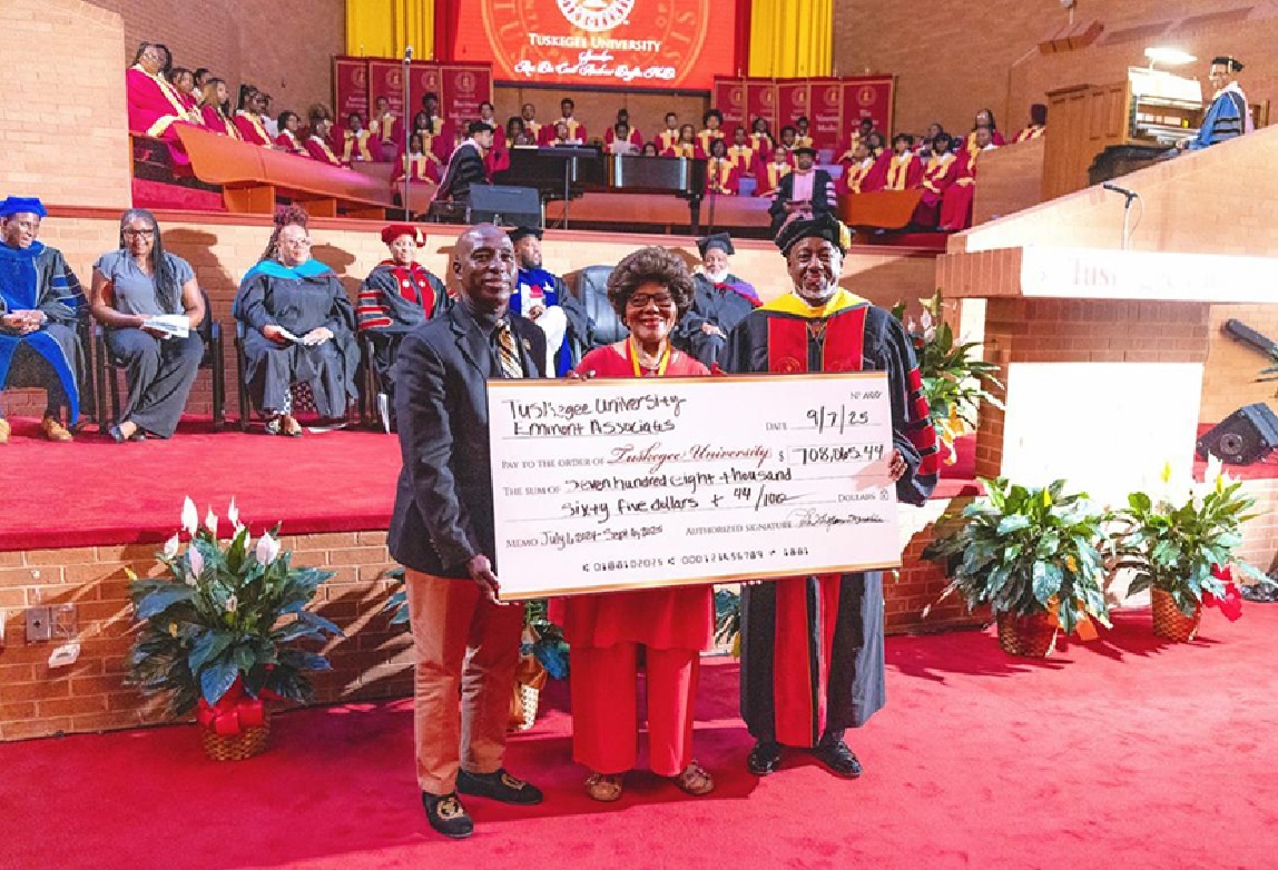 Eminent Associates present check to Dr. Brown at Fall Convocation