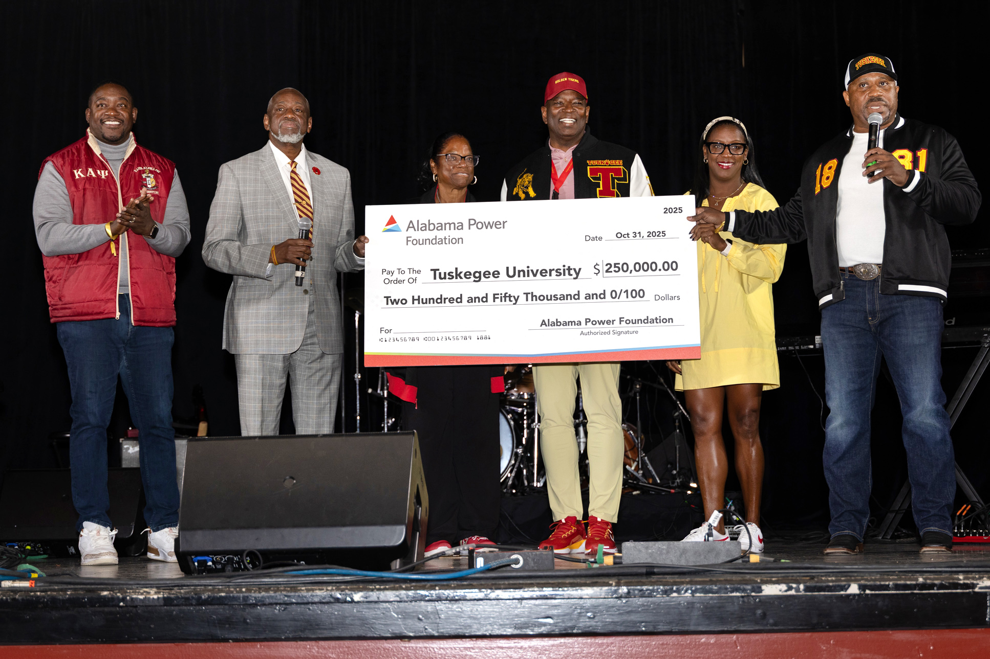 Alabama Power check presentation during Homecoming event
