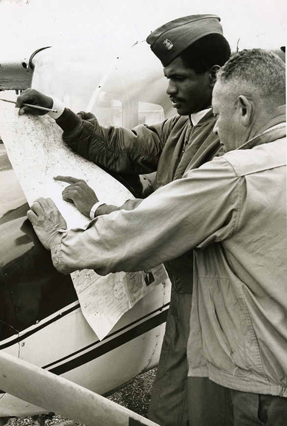 "Chief" Anderson discussing something with a pilot