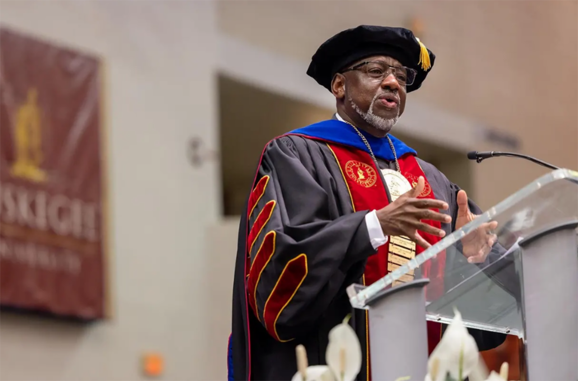 Dr. Mark A. Brown speaking from the podium