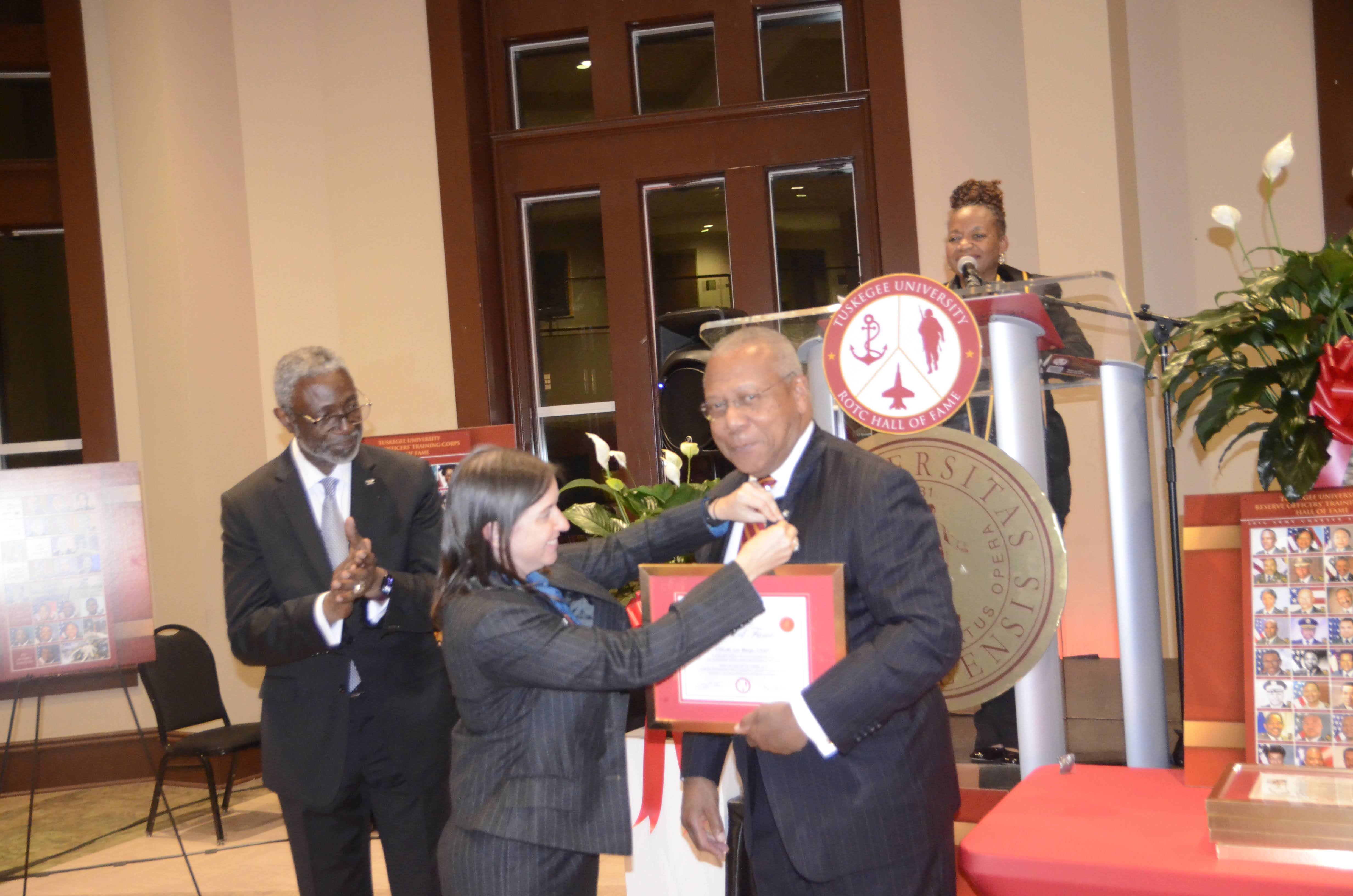 Col. Legand Burge, Jr being pinned