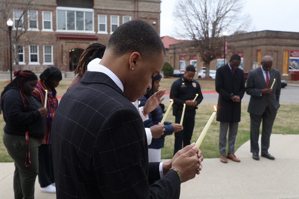 Students and University officials, faculty and staff at the vigil