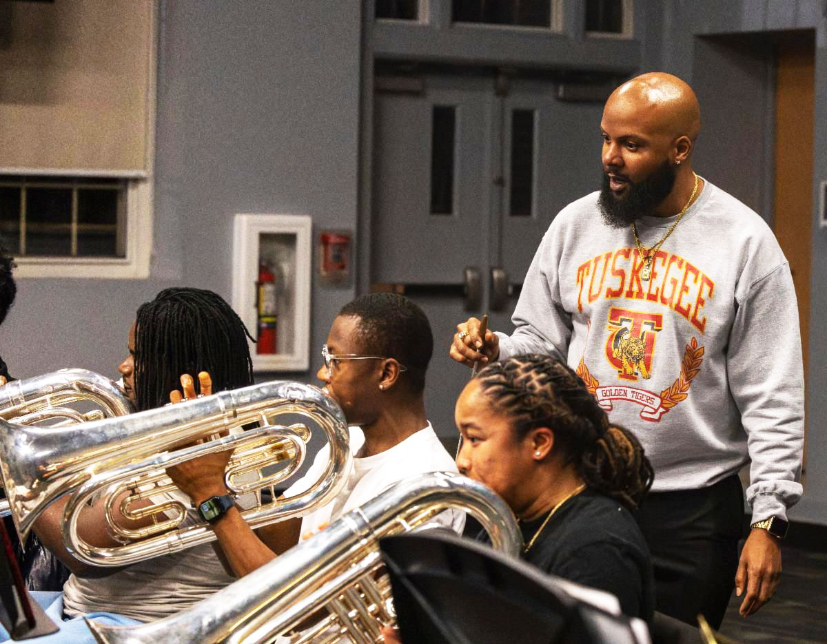 Band director in band room