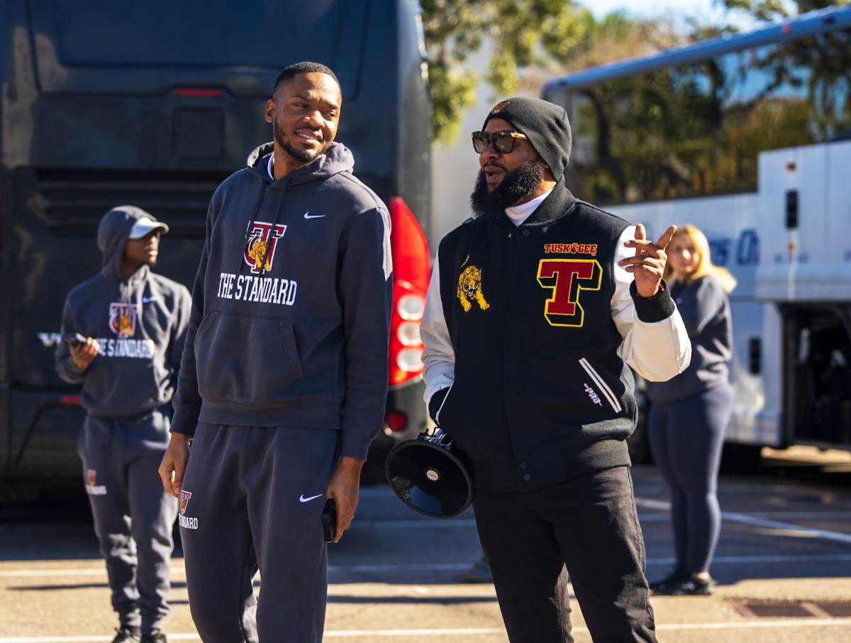 Band director by the bus