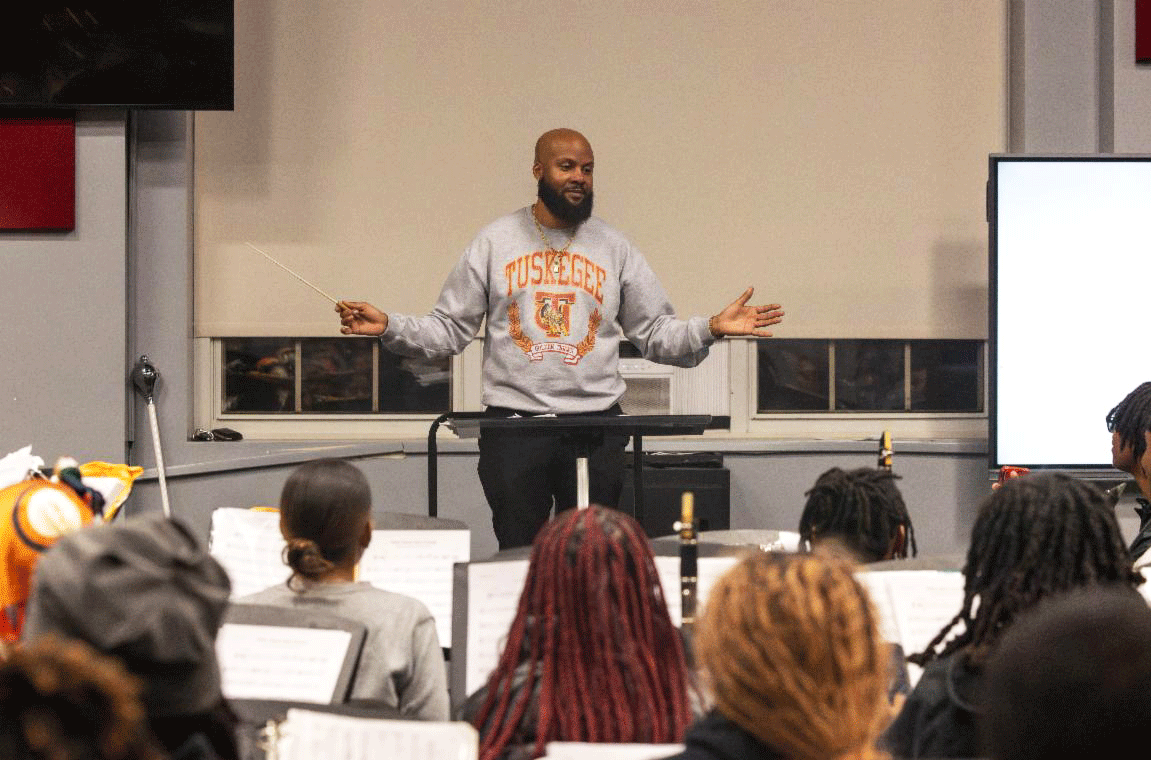 Band director talks to class